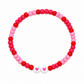 Cupid's Crush beaded bracelet with red, hot pink, and soft pink beads and two white heart beads