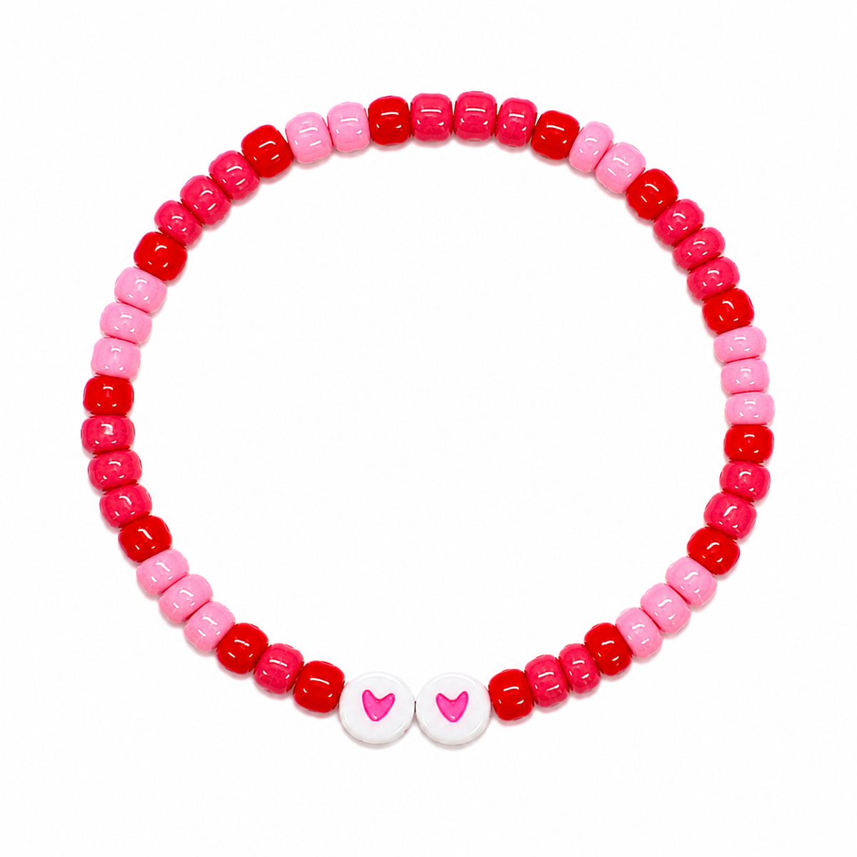 Cupid's Crush beaded bracelet with red, hot pink, and soft pink beads and two white heart beads