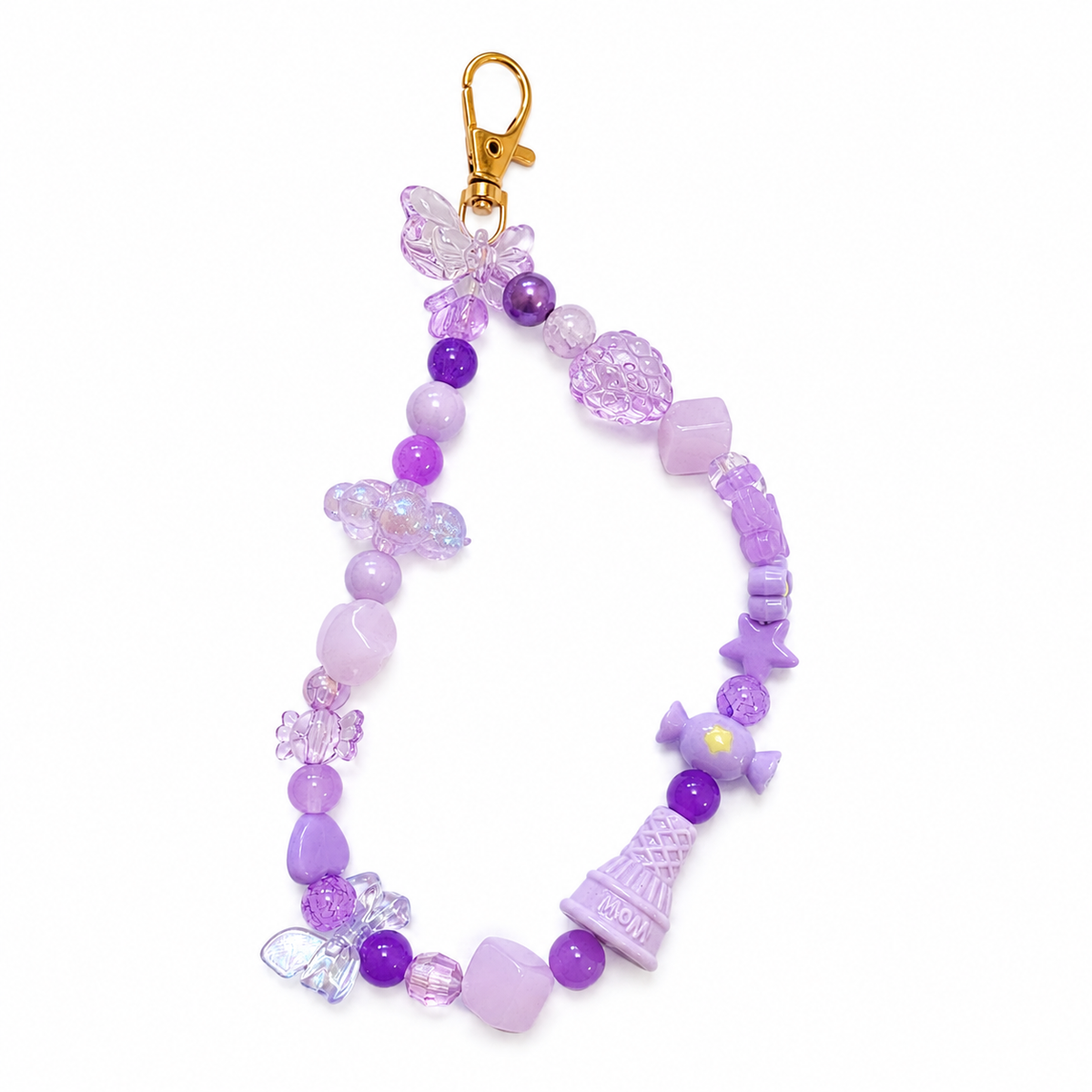 Purple Candy Cloud Bag Charm with butterfly, candy and ice cream charms on a gold lobster clasp