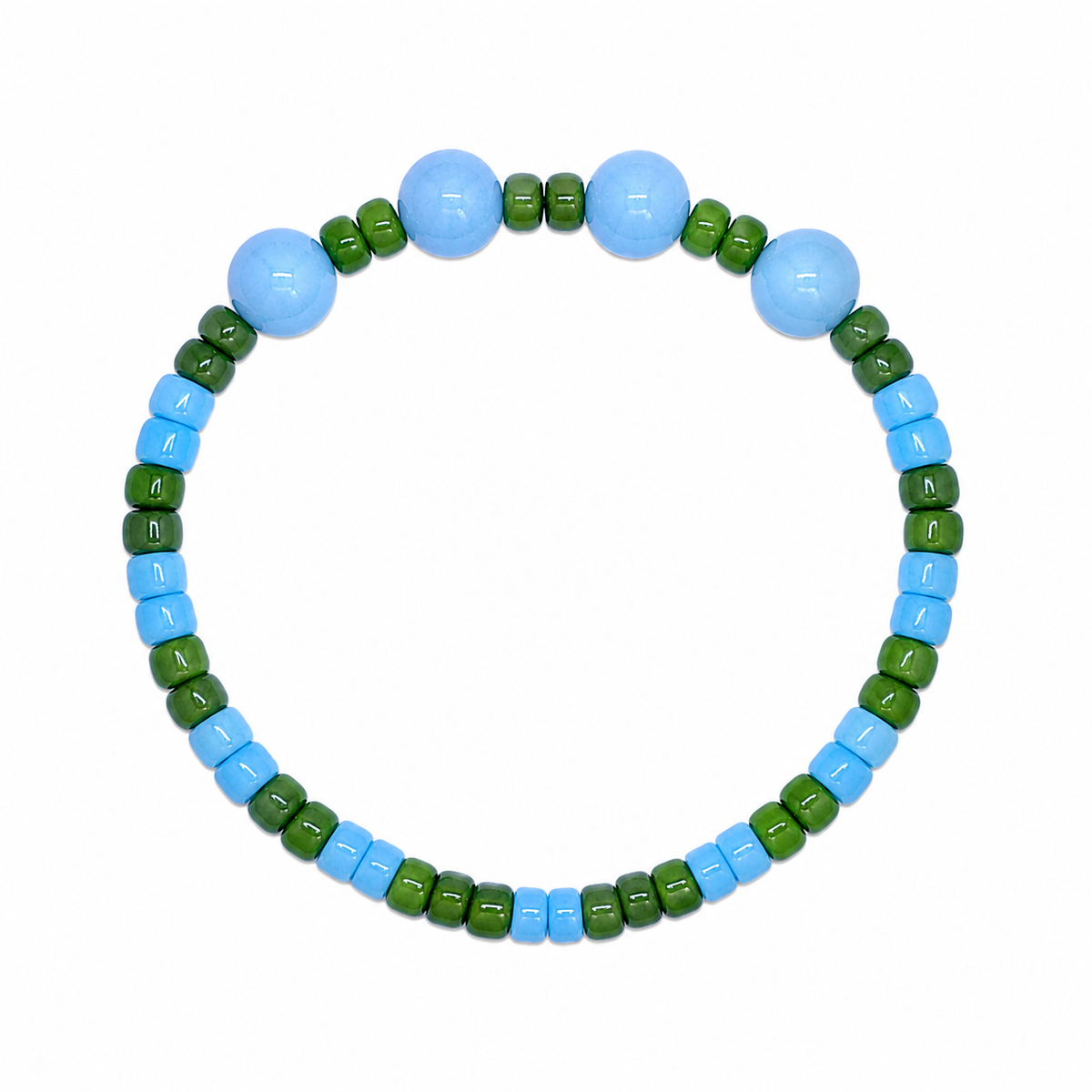 Bluebell Bracelet with sky blue and forest green seed beads and three sky blue moonglow beads