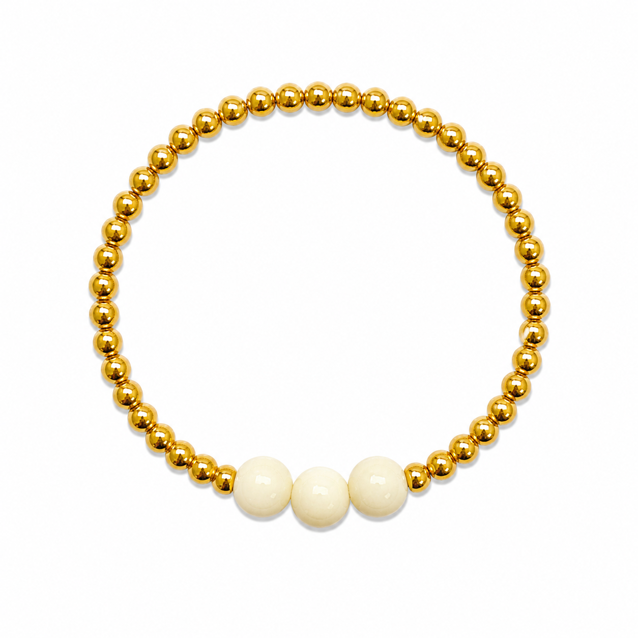 Vanilla Sparkle Bracelet featuring gold beads with three creamy white focal beads