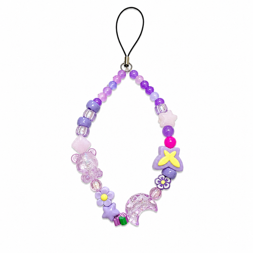 Beary Dreamy Phone Charm featuring a clear bear, purple star, crescent moon and flower charms on purple and pink beads