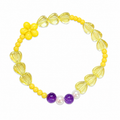 Buttercup Bracelet - clear yellow heart beads and yellow seed beads with a daisy charm and purple and pearl accent beads