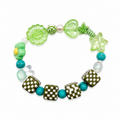 Garden Giggles Bracelet with green flower and butterfly charms, checkered cube beads and turquoise beads