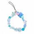 Frosted Fantasy Bag Charm with clear iridescent beads, blue flower, teal star, pink cloud and Sweet charm on a black cord loop
