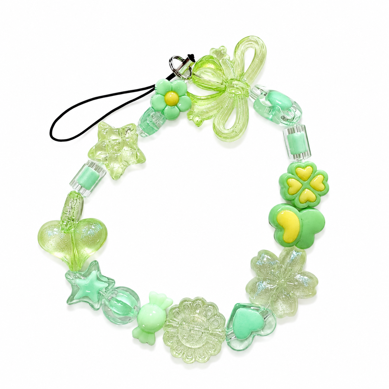 Garden Glow Bag Charm with green glittery charms including stars flowers clover hearts and a bow
